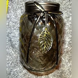 Glass jar with raised pattern on glass